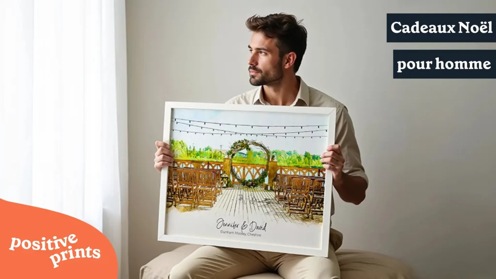 Cadeaux de Noël personnalisés pour homme homme tenant affiche aquarelle lieu mariage Jennifer David avec logo Positive Prints